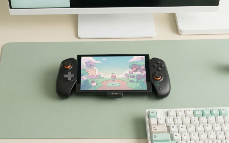 Kontroler YAXO Evo Deck do Nintendo Switch 2 na biurku obok klawiatury