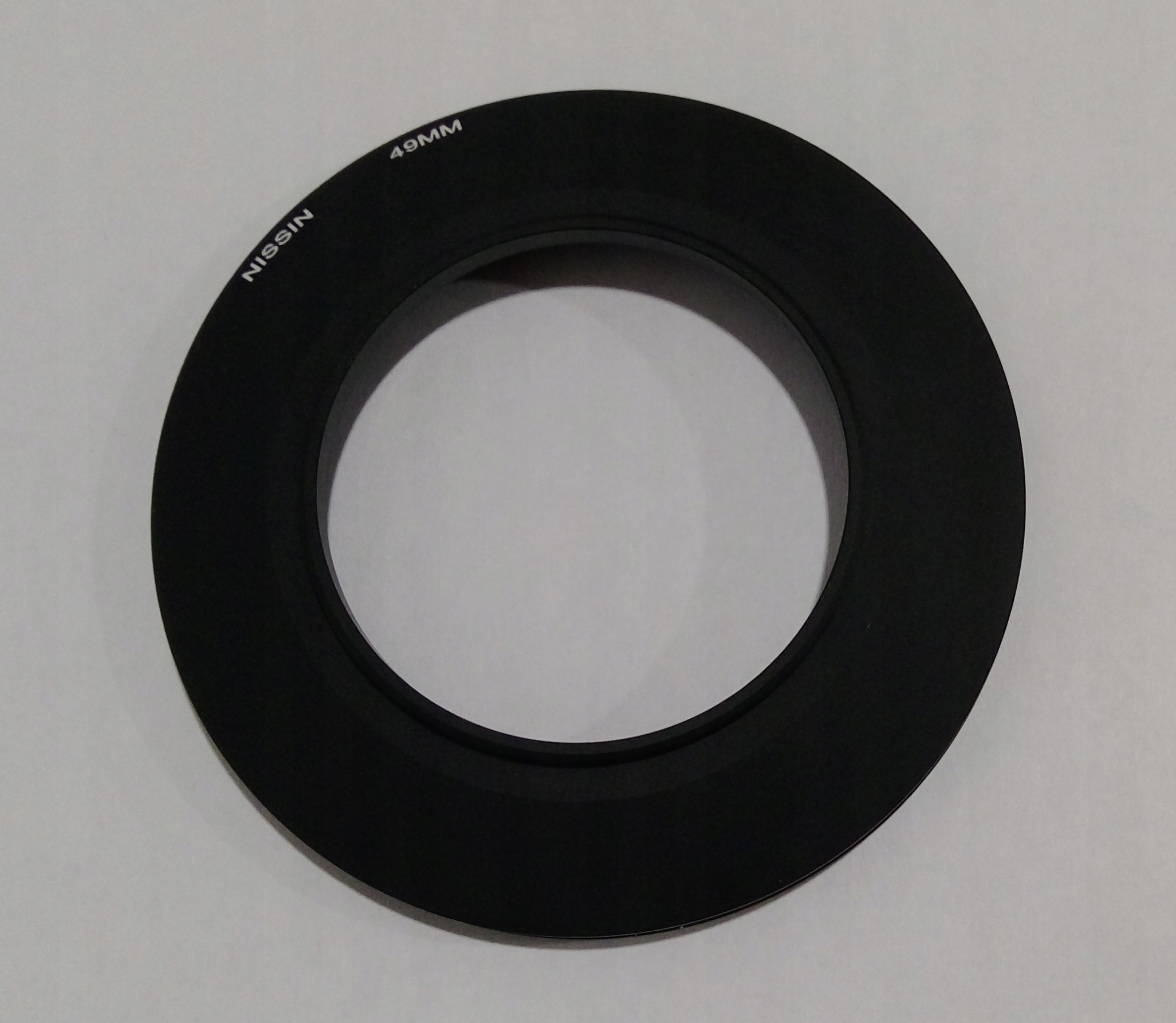 Konwerter Nissin Adapter Ring MF18 49mm – Idealne rozwiązanie dla Twojego aparatu